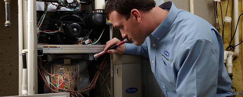 Carrier service tech with furnace